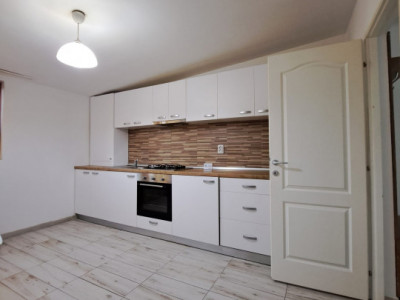 Apartament cu 2 dormitoare + living cu bucatarie, parcare subterana
